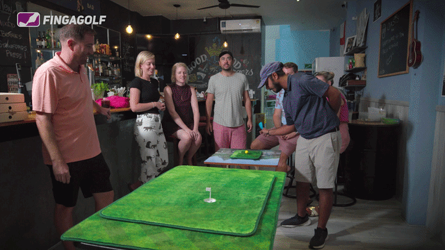 Fingagolf being played in a bar